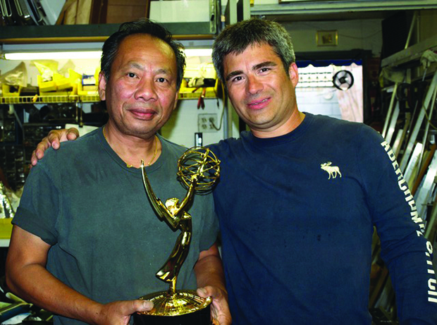 After the Emmy ceremonies, Henry Embry brought his statuette to the shop to share the win with Chinhda. Photo by David Waelder